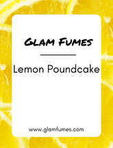 A bottle of perfume or body oil with the label 'Glam Fumes Lemon Poundcake' displayed prominently against a background of lemon slices.